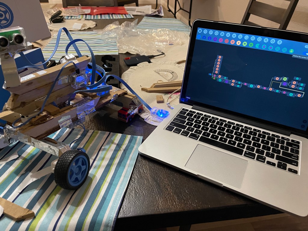 This is a self driving robot with incomplete code that can make decisions on where to turn with only one sensor.